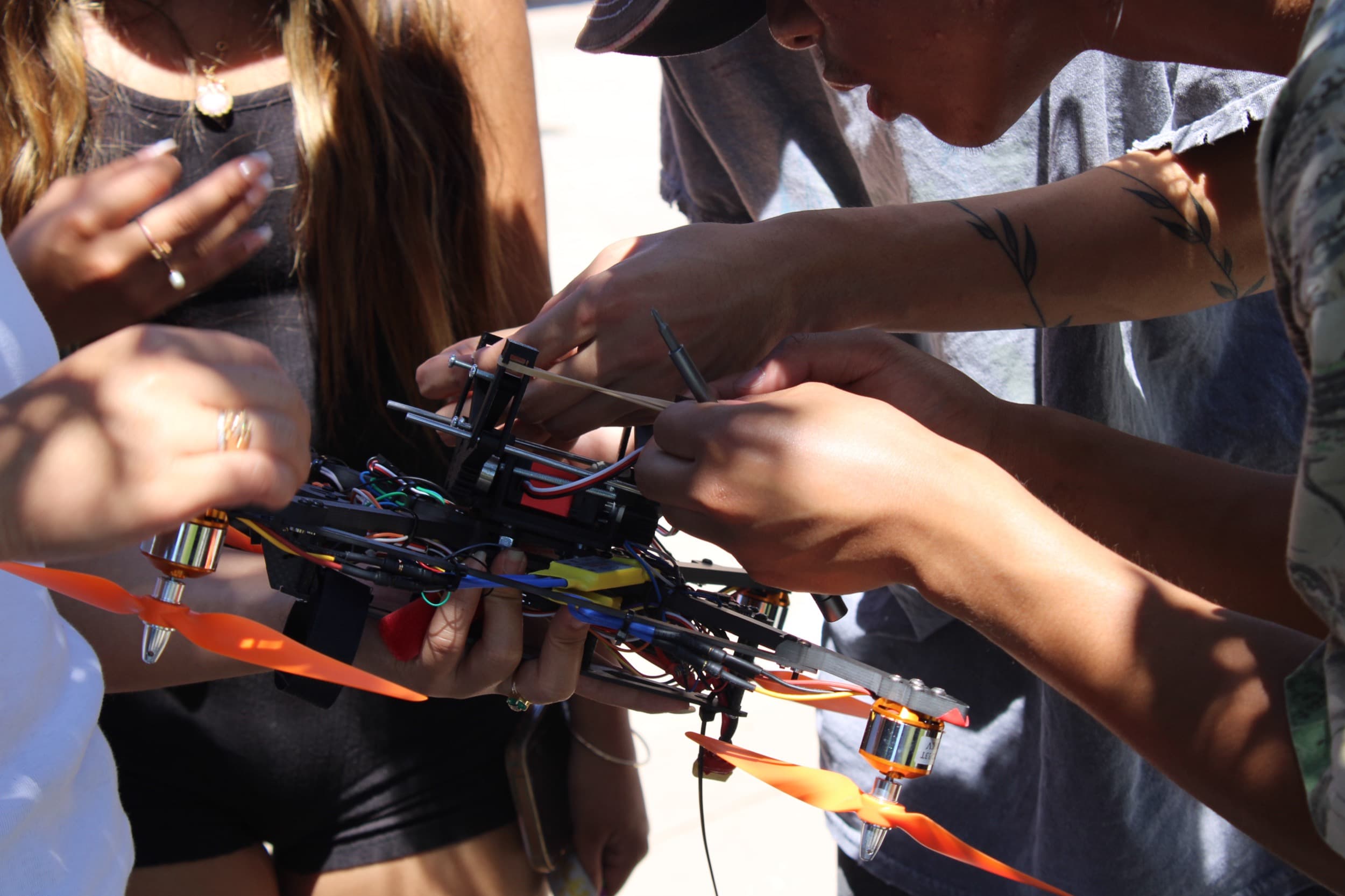 FUSION members working on a robotics project